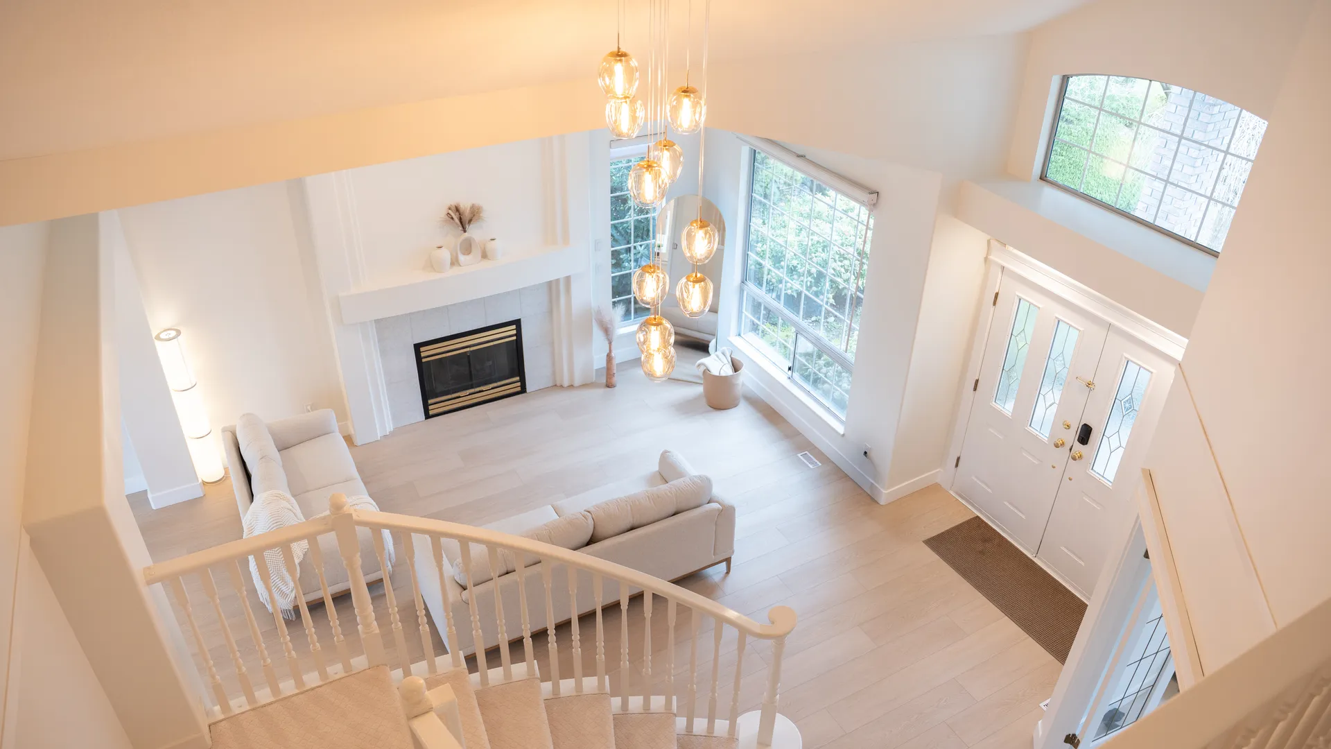 View from the landing over the living room and entry